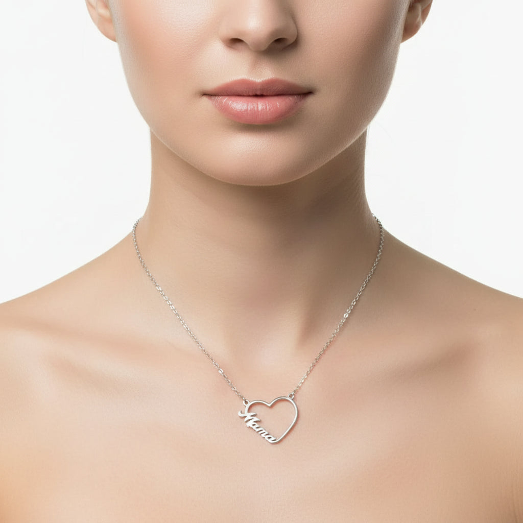 Heart-shaped necklace with 'Mama' engraving on a white vase